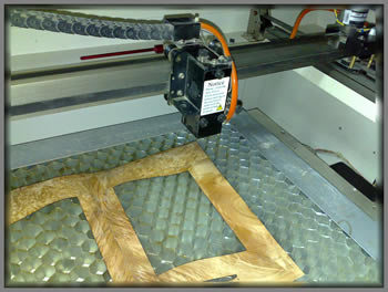 Laser marquetry cutter view of cutter bed