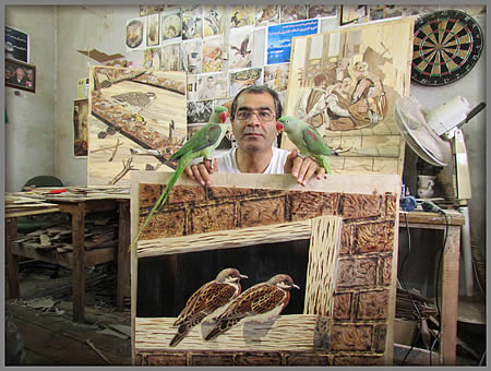 Hamid with two marquetry models!